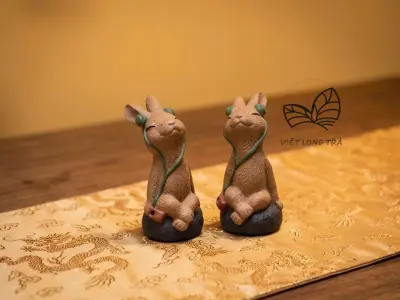 MUSIC-LISTENING RABBIT IN FIRED CLAY - HANDMADE TEA PET